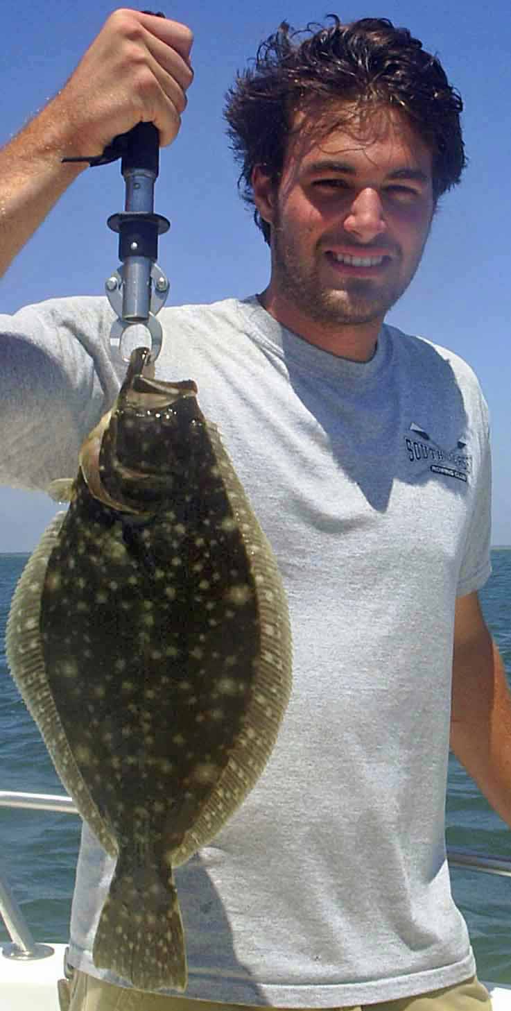 Fish for huge flounder with time out charters!